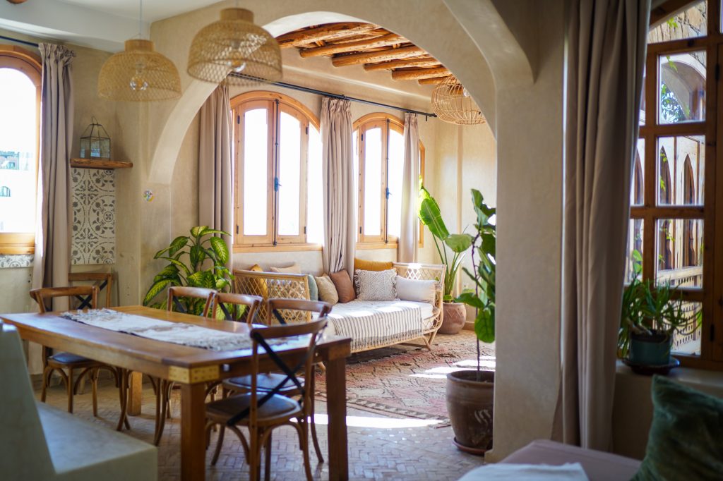 A flat in a maroccain Riad with bright furniture and big windows